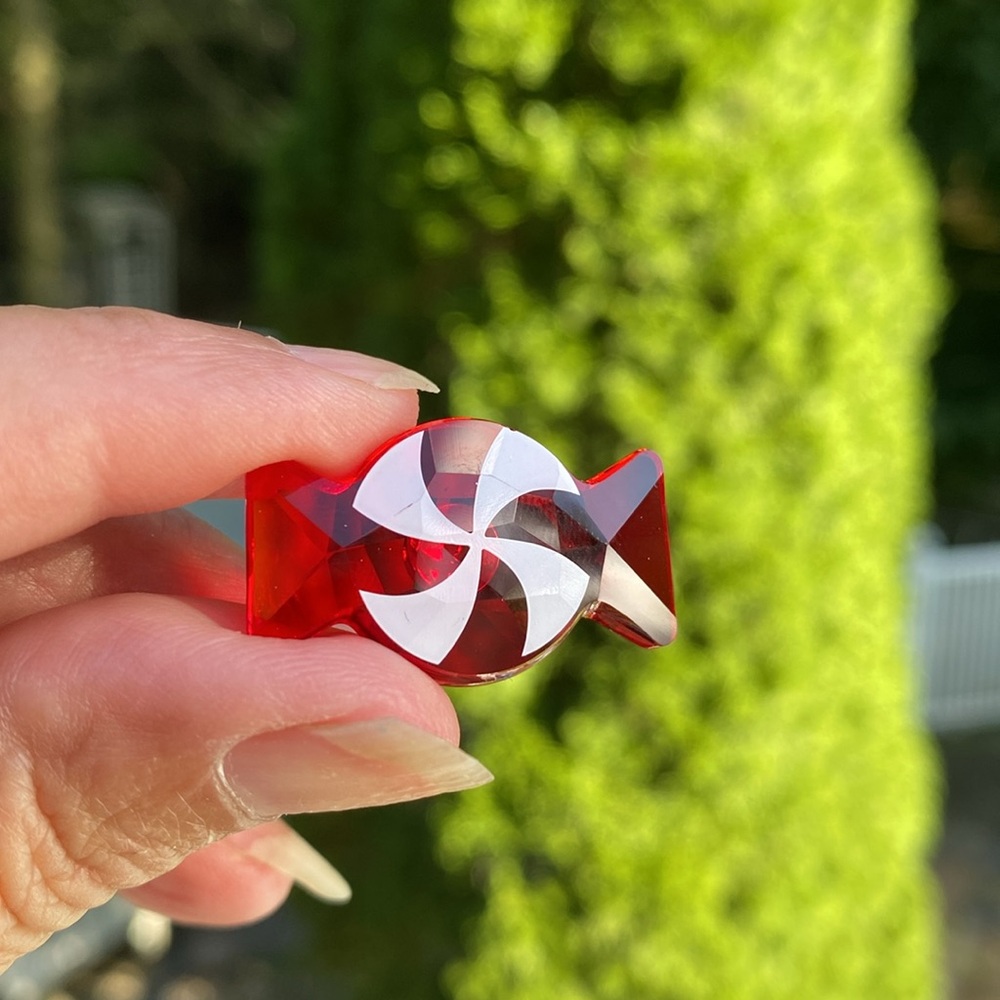 Swarovski crystal holiday peppermint candy magnet decor. About 3/4 x 1 1/8 in
